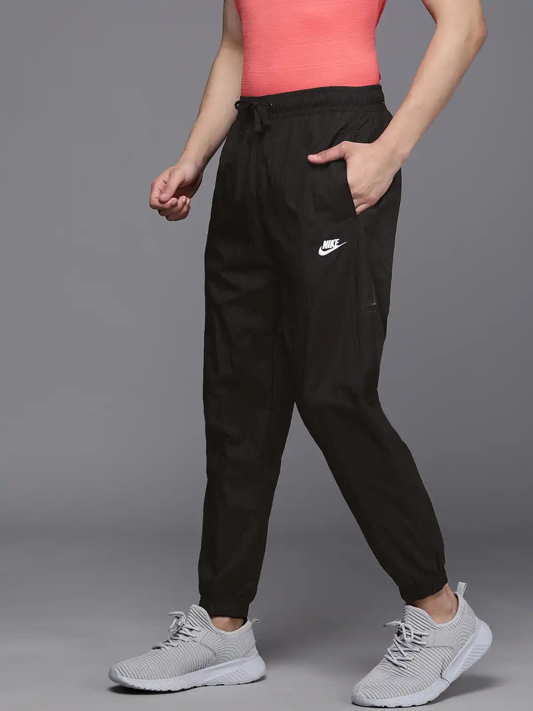 Buy Nike Men Black Solid Standard Fit AS M NSW SPE WVN LND Joggers