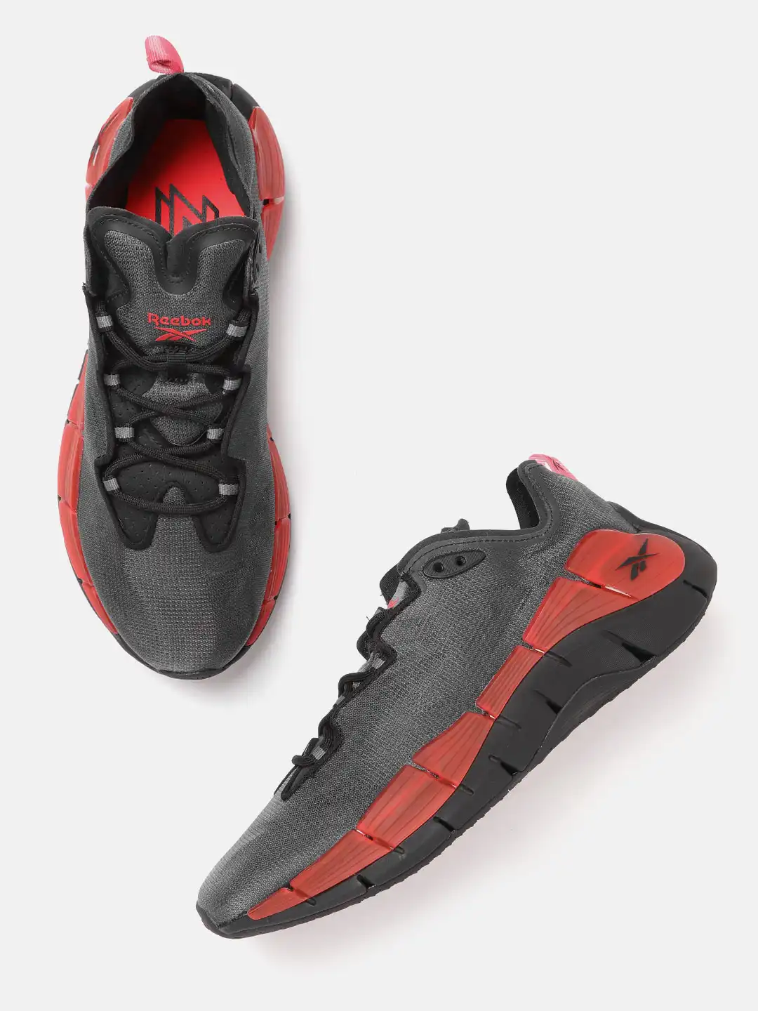 Buy Reebok Unisex Charcoal Grey & Coral Orange Woven Design Zig