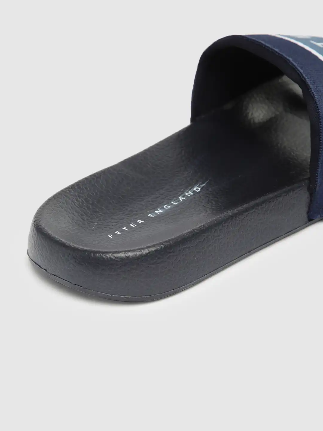 Buy Peter England Men Blue Logo Printed Sliders - Flip Flops for