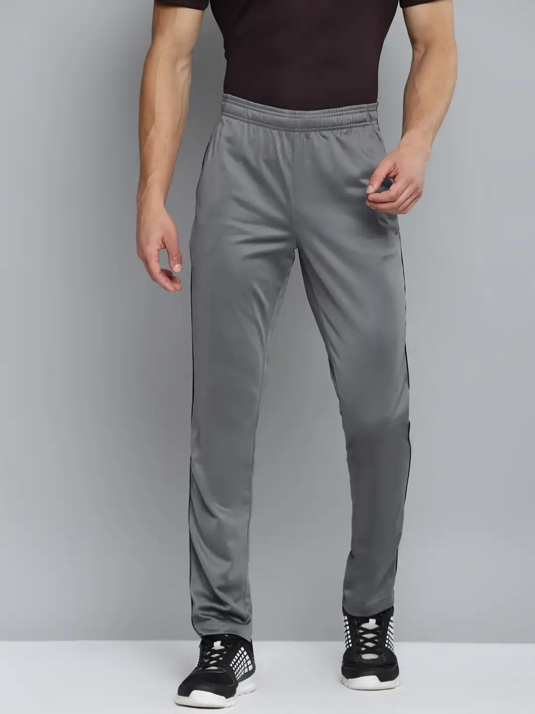 Buy Reebok Men Charcoal Grey Solid Neo Speedwick Track Pants