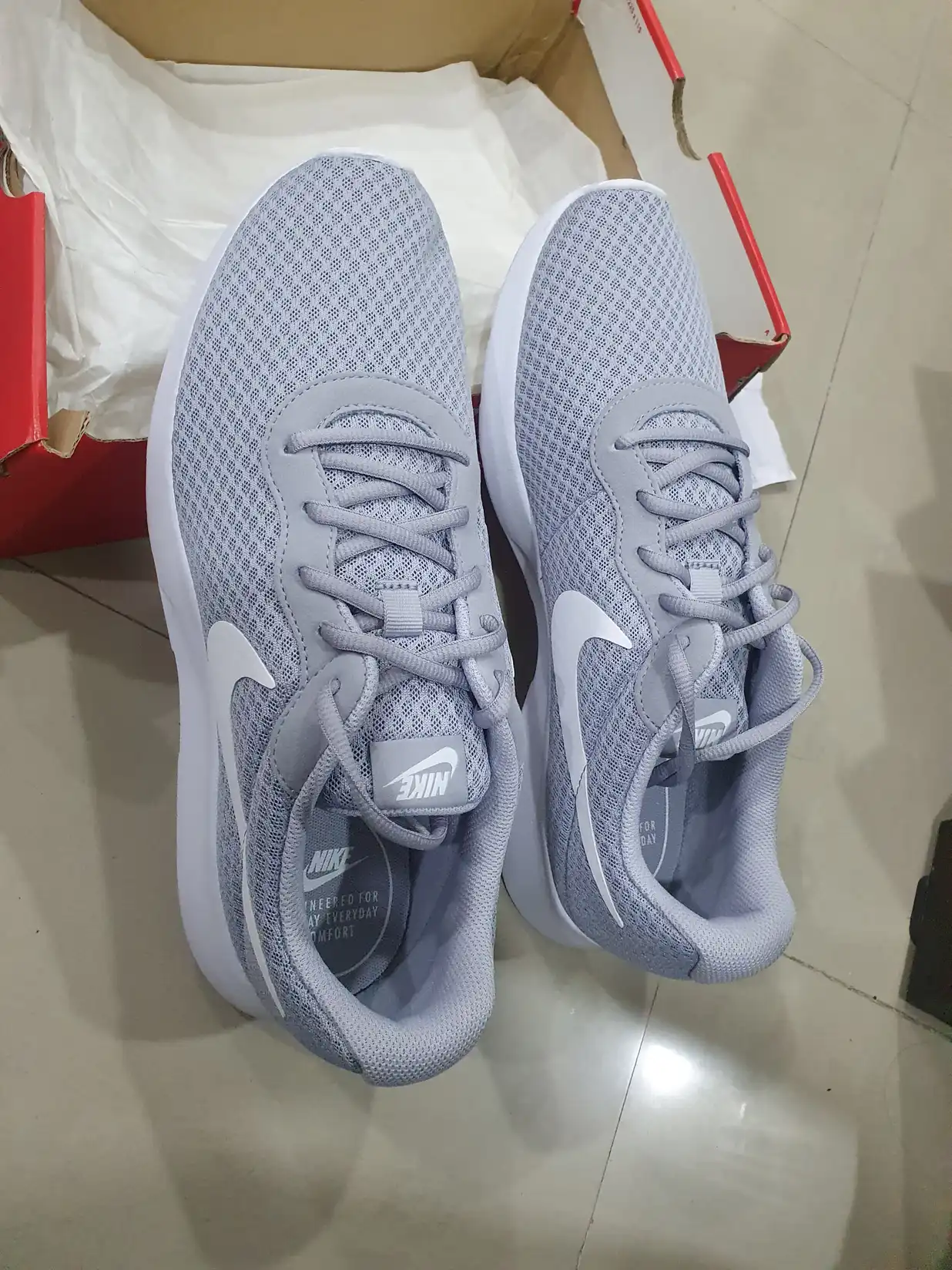 nike grey tanjun sneakers