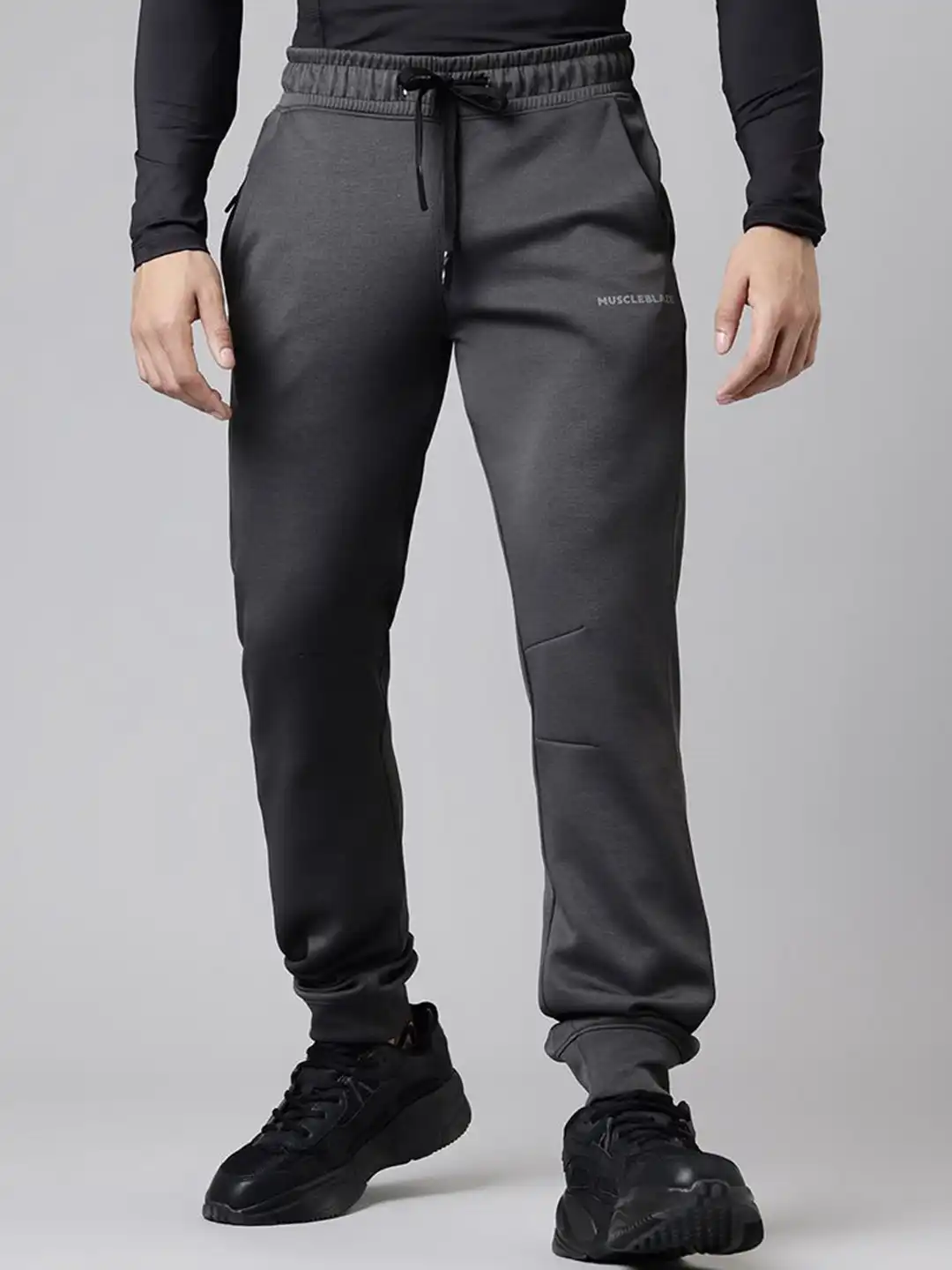 Buy MuscleBlaze Men Solid Squat-Proof Joggers - Track Pants for