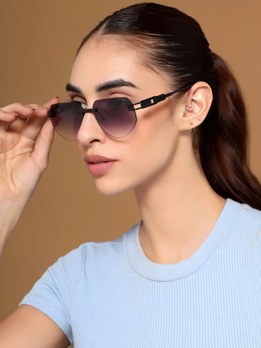 Mirage: Voyage Lumière Buy Voyage Unisex Rimless Sunglasses with UV Protected Lens