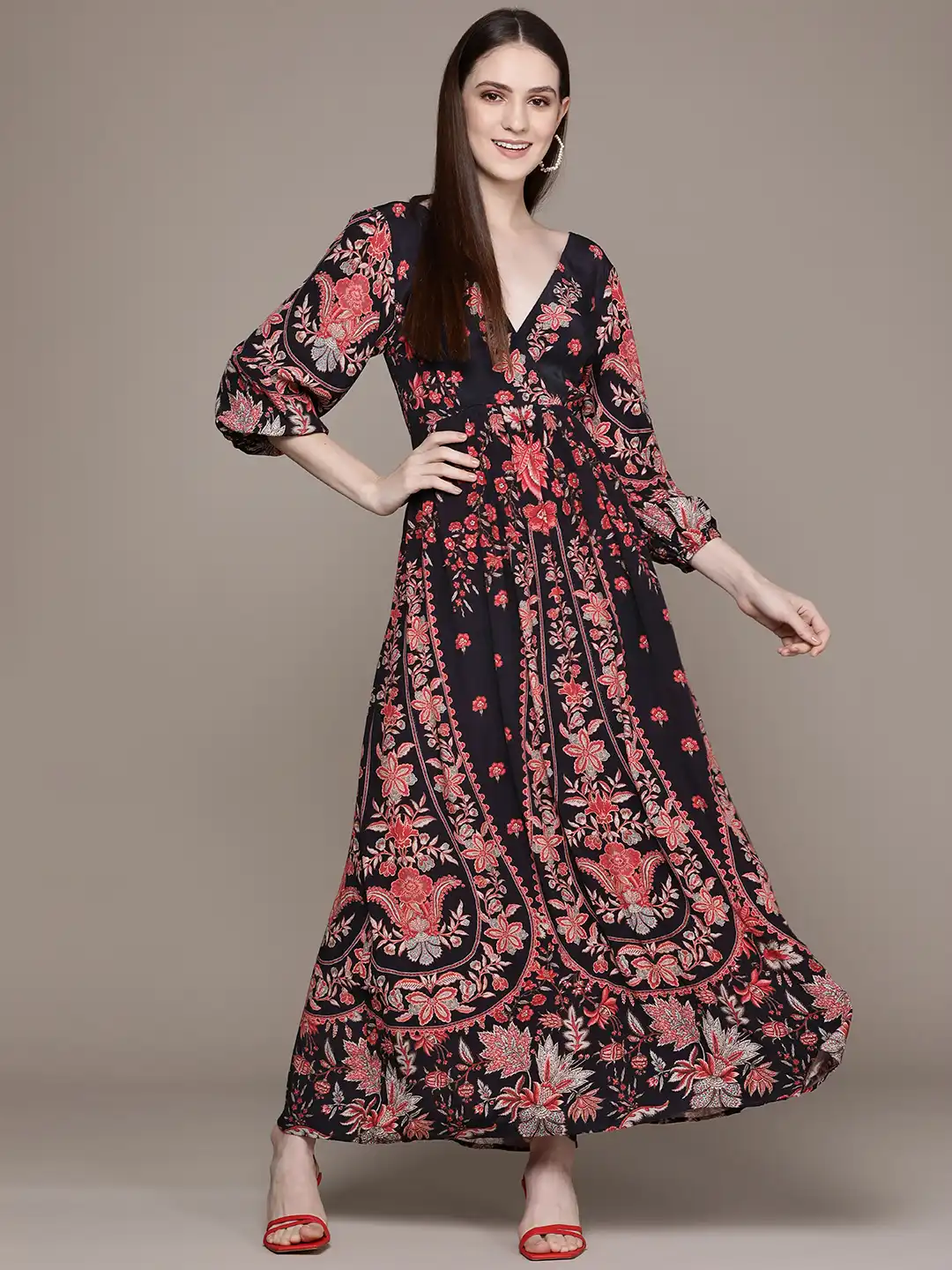 long sleeve fit and flare maxi dress BCBG MAXAZRIA Long Sleeve Fit and Flare Maxi Dress with Cut Outs