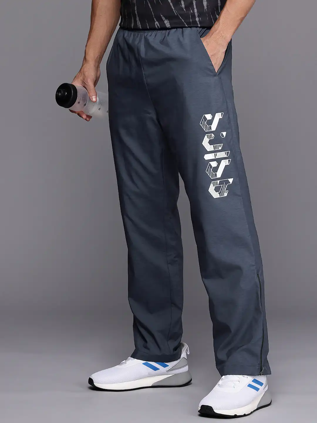 Buy ASICS Men Brand Logo Water Repellent Training or Gym Sports