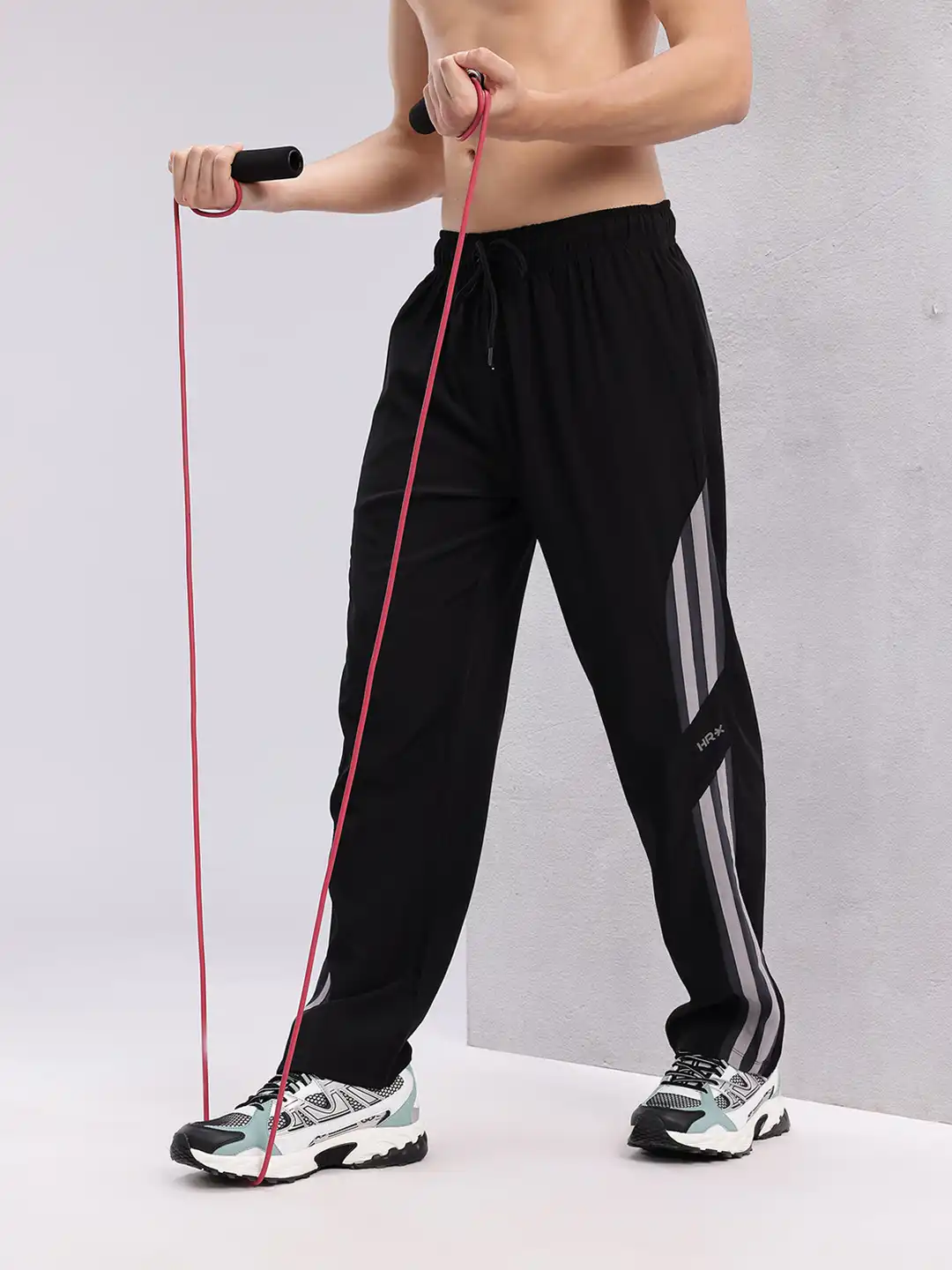 Buy HRX by Hrithik Roshan Men Solid Track Pant - Track Pants for