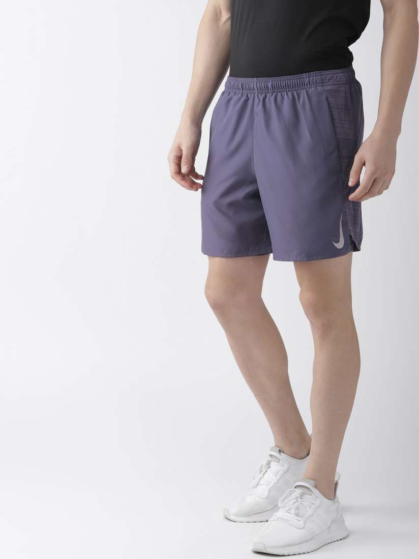 Buy Nike Challenger Men Purple Solid AS M NK CHLLGR SHORT 7IN 2IN1 Standard Fit Shorts Shorts for Men 10139411 Myntra