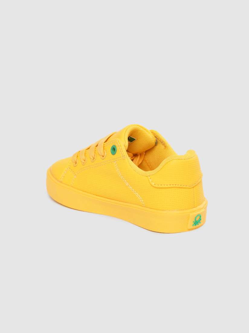 Benetton yellow shoes shop