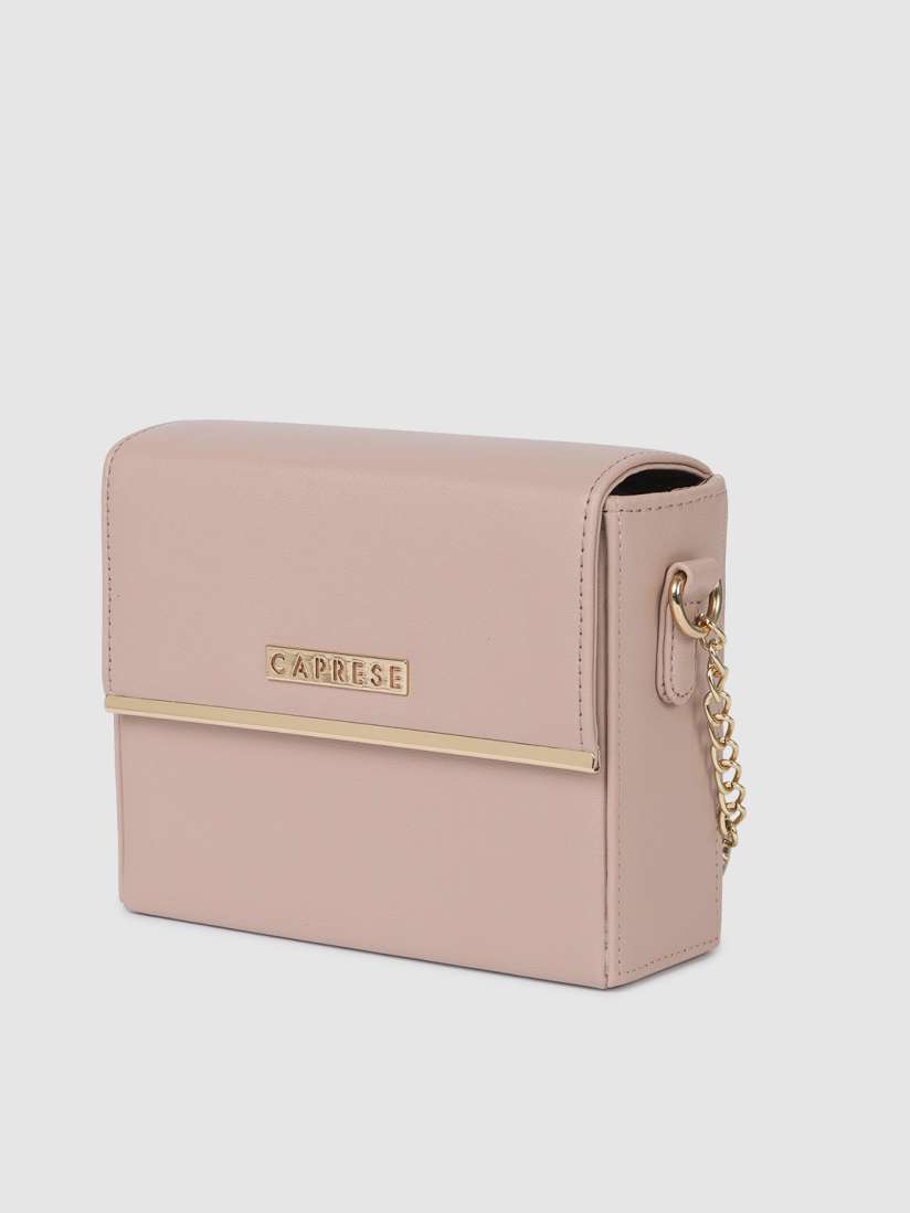 Caprese pink solid sling bag discount