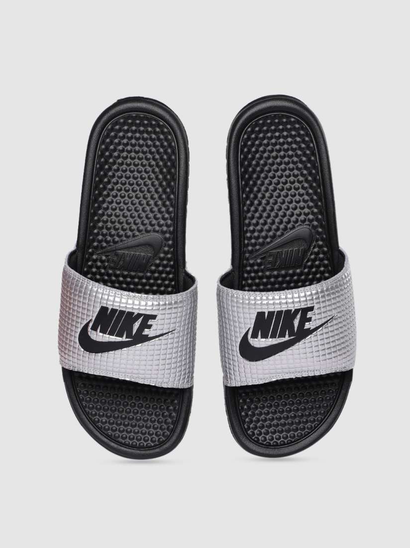 Silver nike flip flops sales