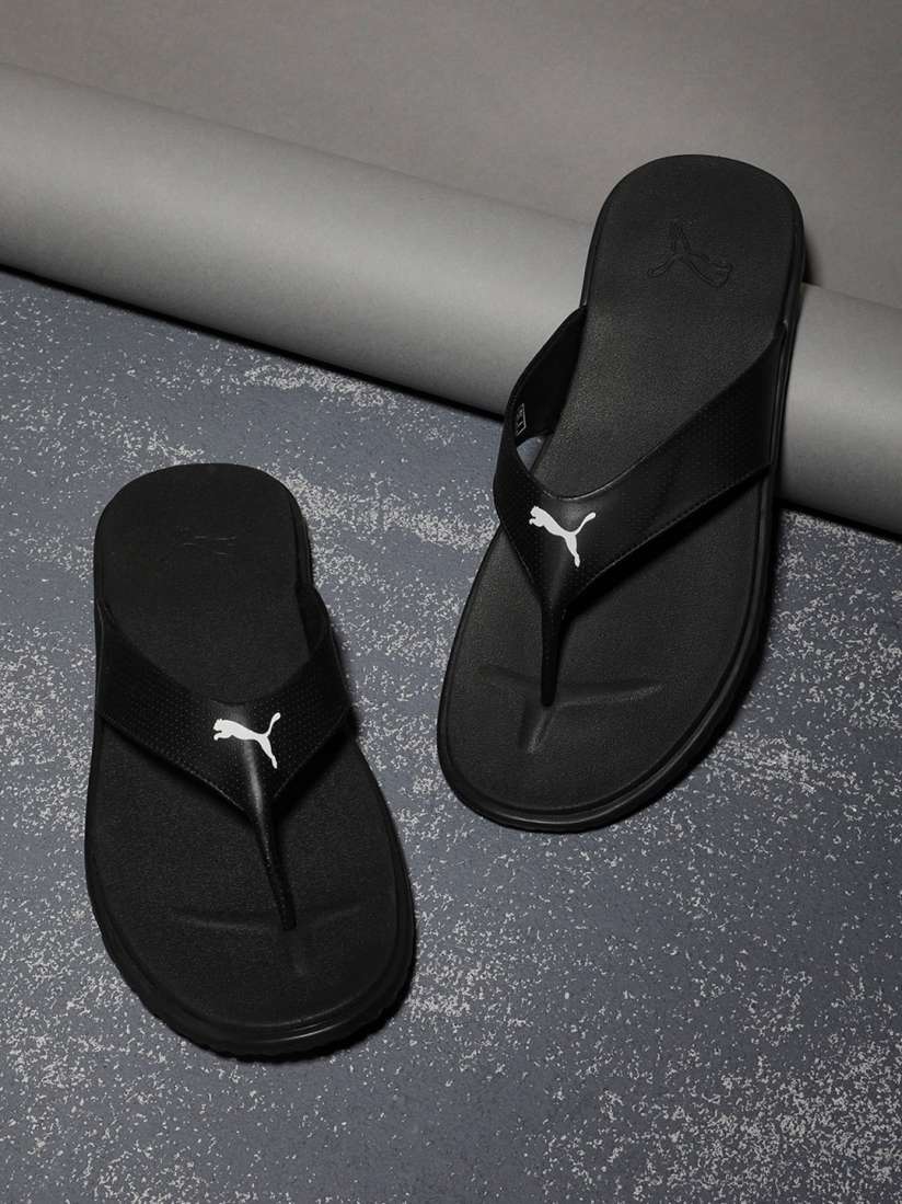 Puma black flip flops discount