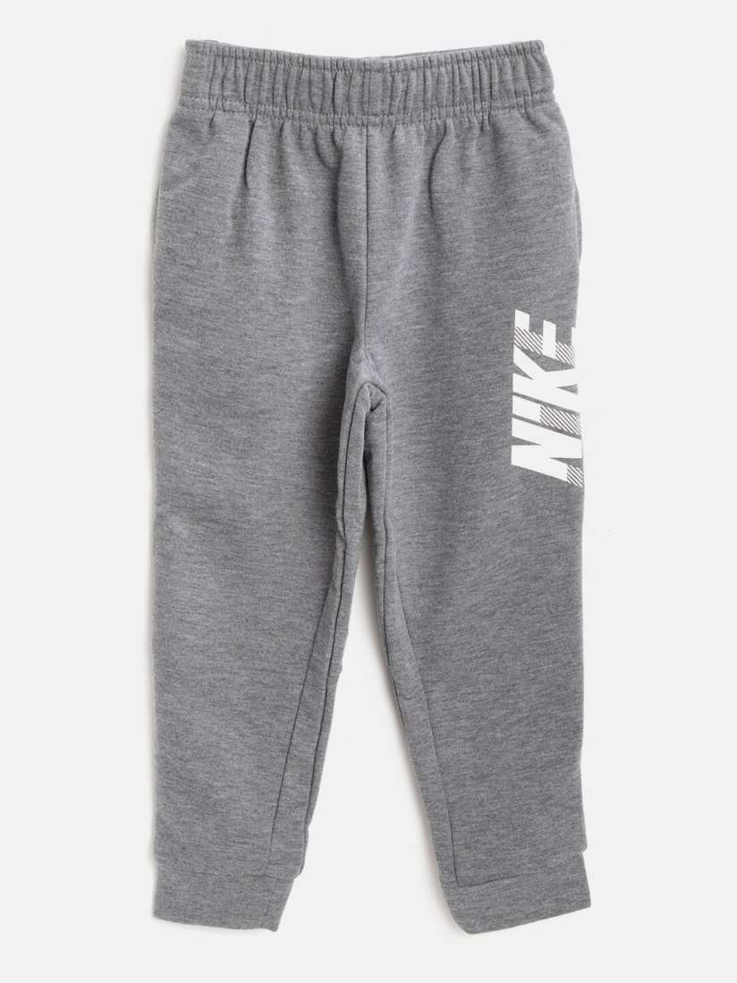 Nike slim fit joggers boys shop