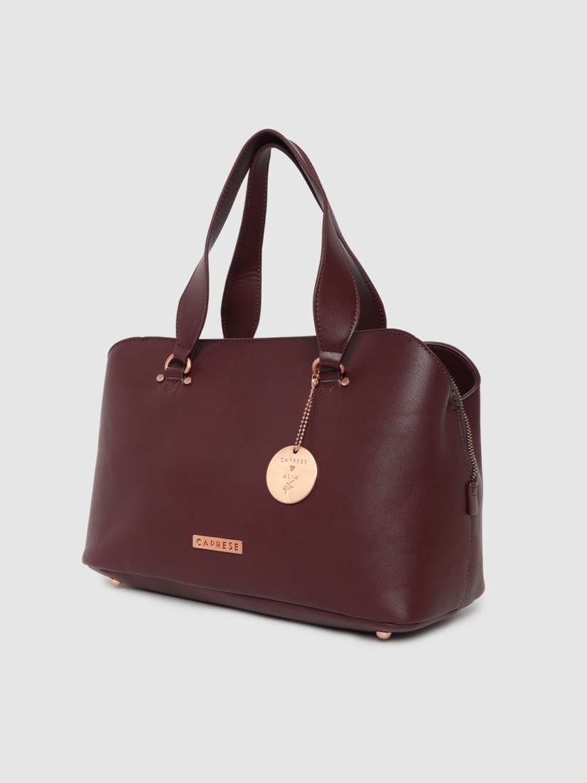 Caprese maroon solid handheld bag best sale