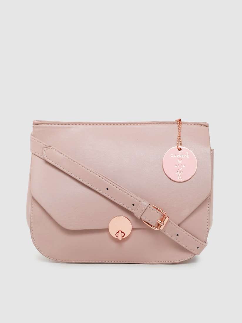 Caprese pink solid sling bag shop