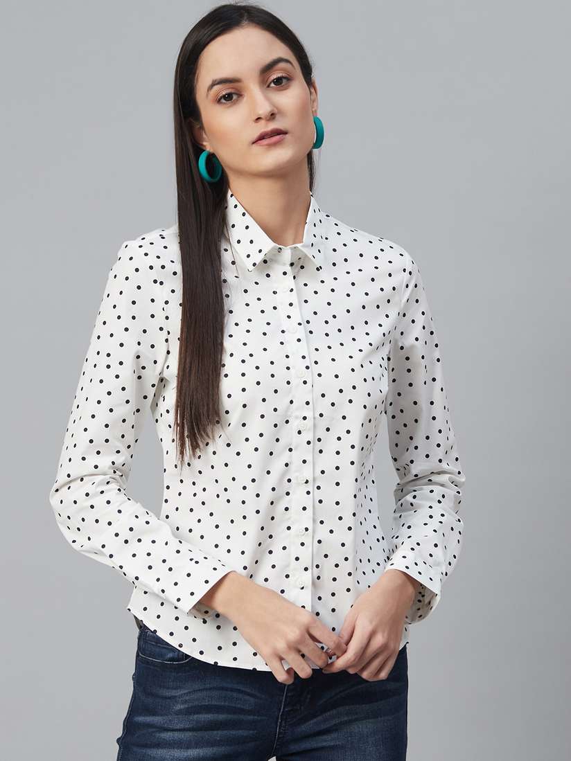 white shirt with navy polka dots
