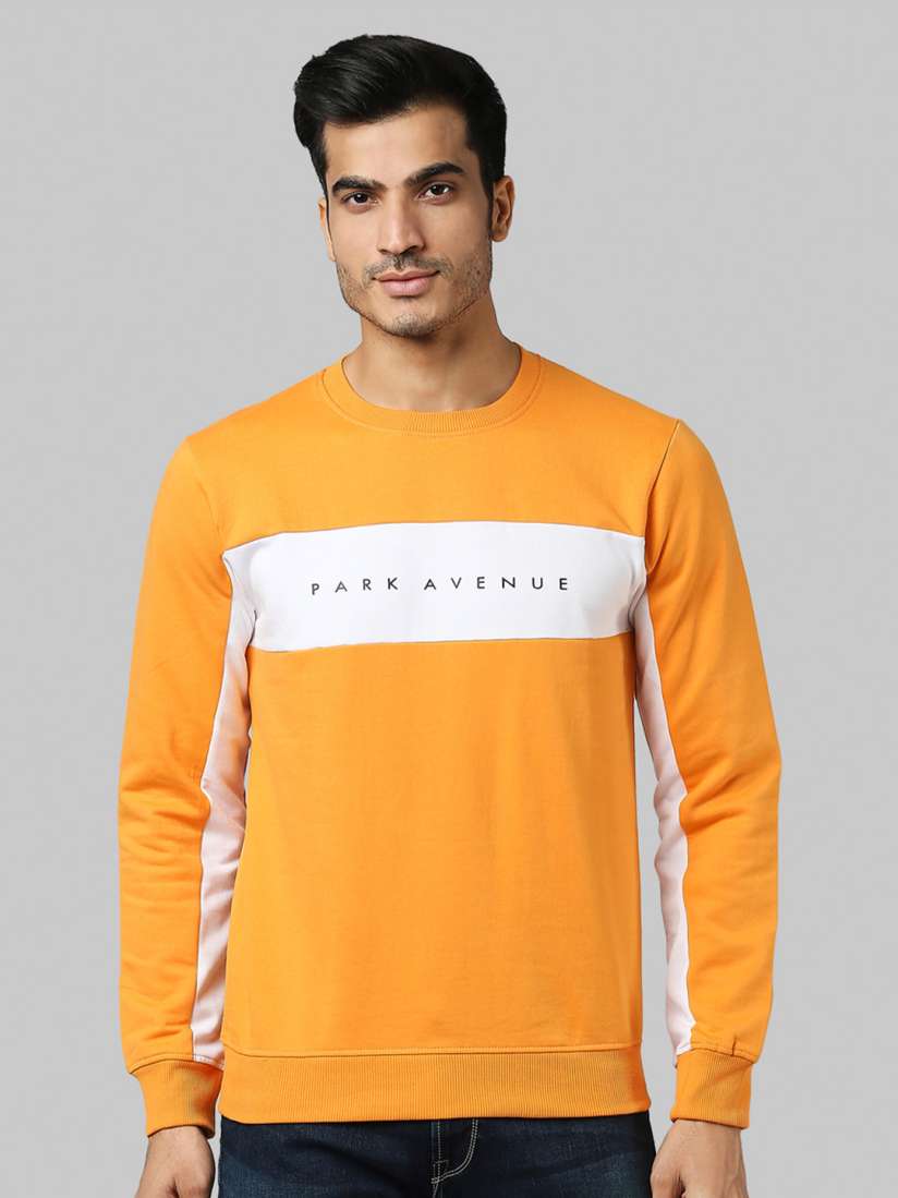 Orange and white sweatshirt on sale