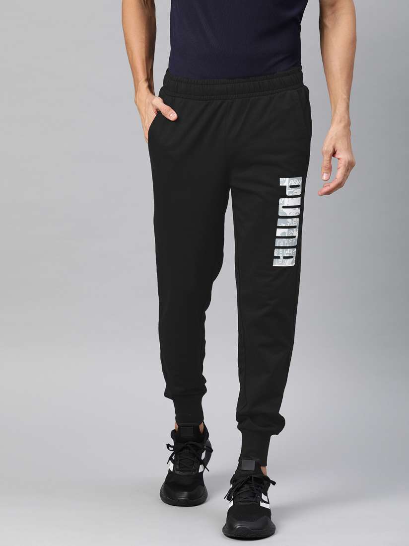 Buy Puma Men Black Sweatpants BT Solid Joggers with Printed Detail Track Pants for Men 13036320 Myntra