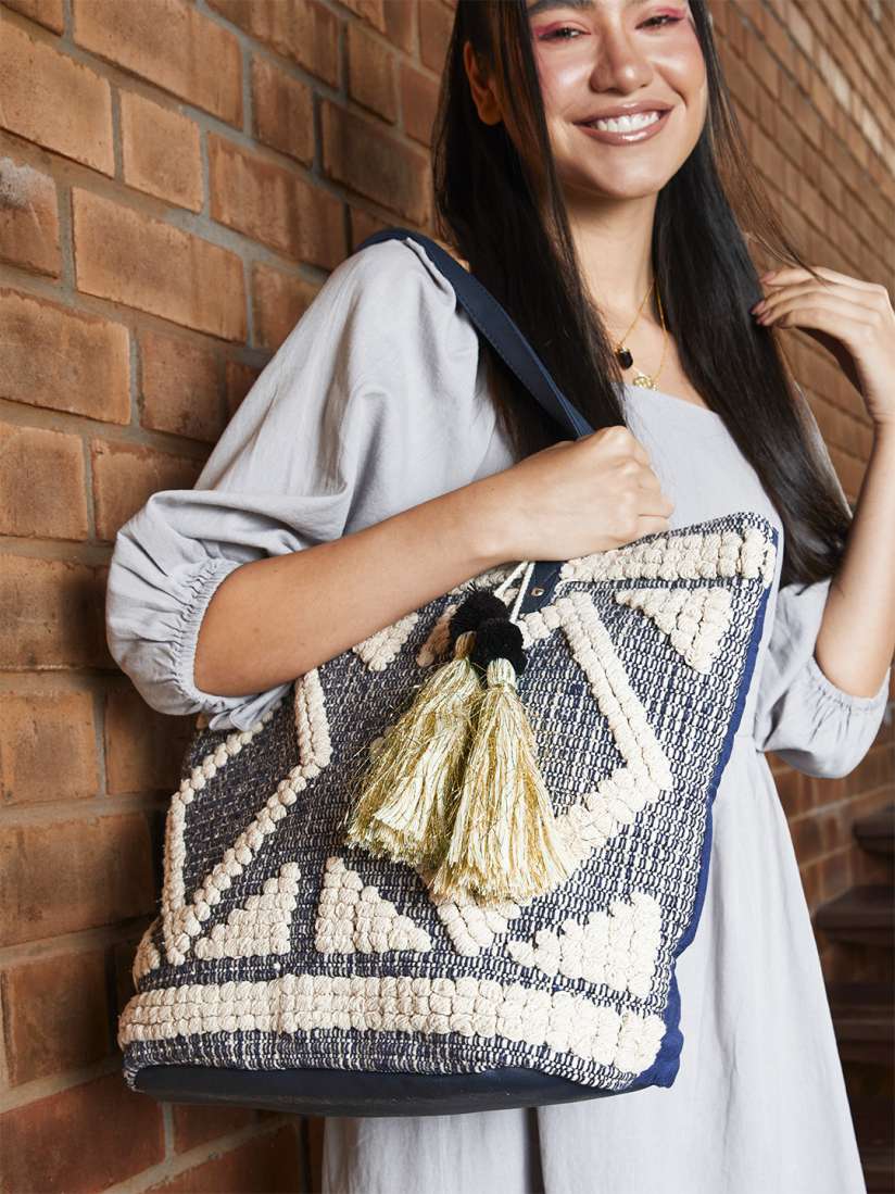 Buy Anouk Women Navy Blue Off White Woven Design Shoulder Bag with Tasselled Detail Handbags for Women 13064068 Myntra