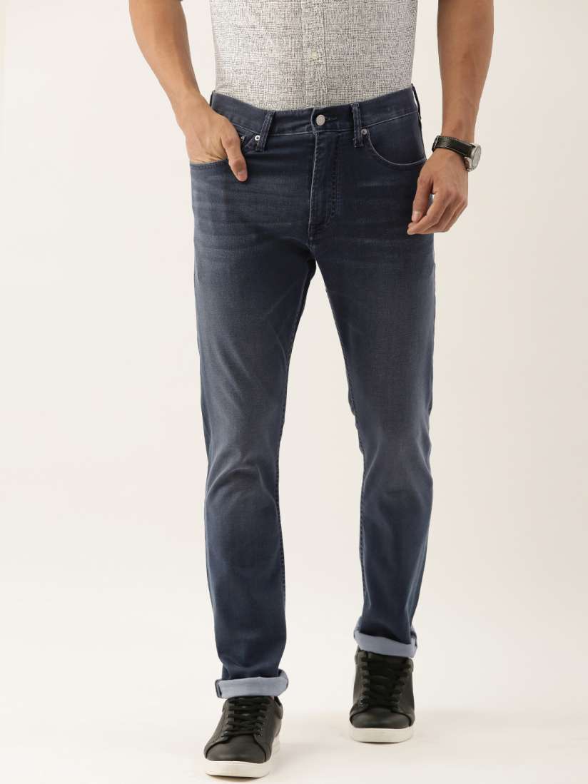 Buy Calvin Klein Jeans Men Blue Athletic Tapered Fit Mid Rise Clean Look Stretchable Jeans Jeans for Men 13420920 Myntra
