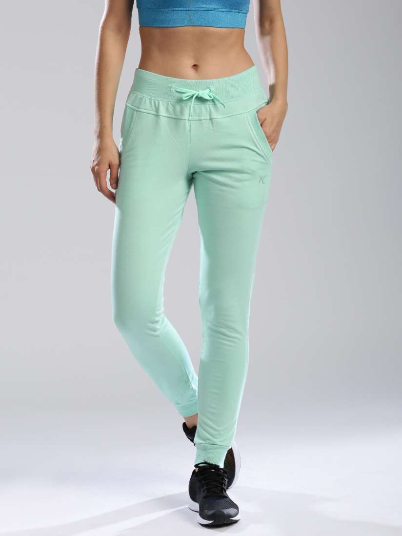 Mint green track pants online