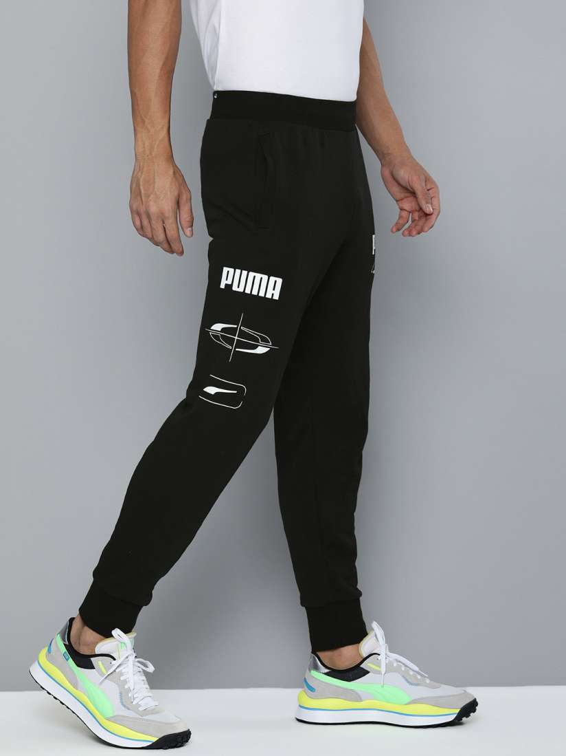 Buy PUma Men Black Solid REBEL Cl Tr Jogger Pantrs Track Pants for Men 13502056 Myntra