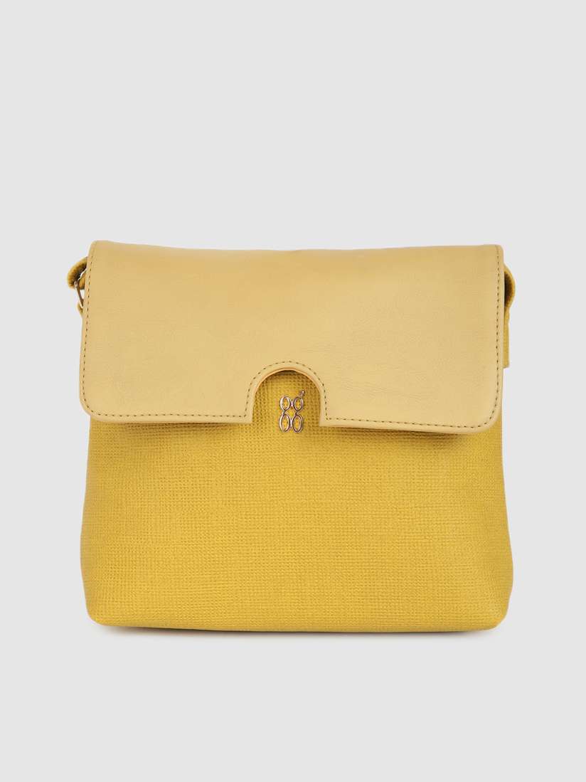 Baggit mustard yellow solid sling bag discount