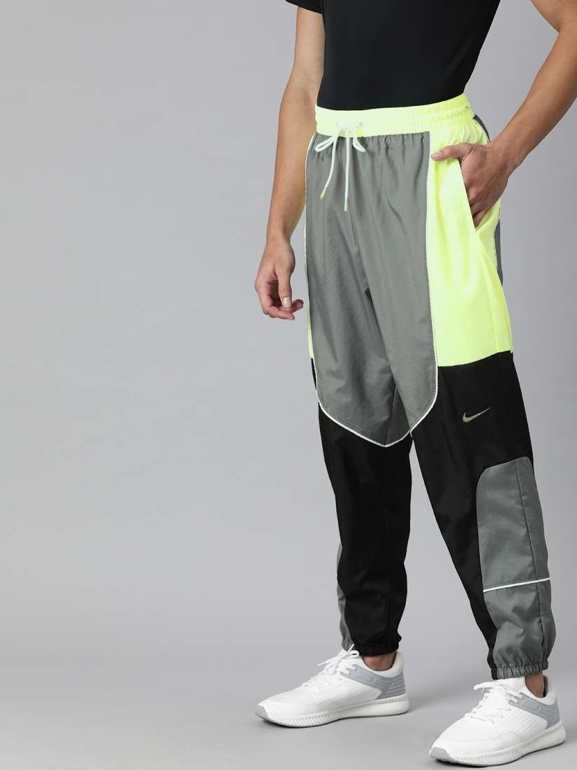 Buy Nike Men s Grey and Florecent Green Colourblocked Basketball Pants Track Pants for Men 13677524 Myntra