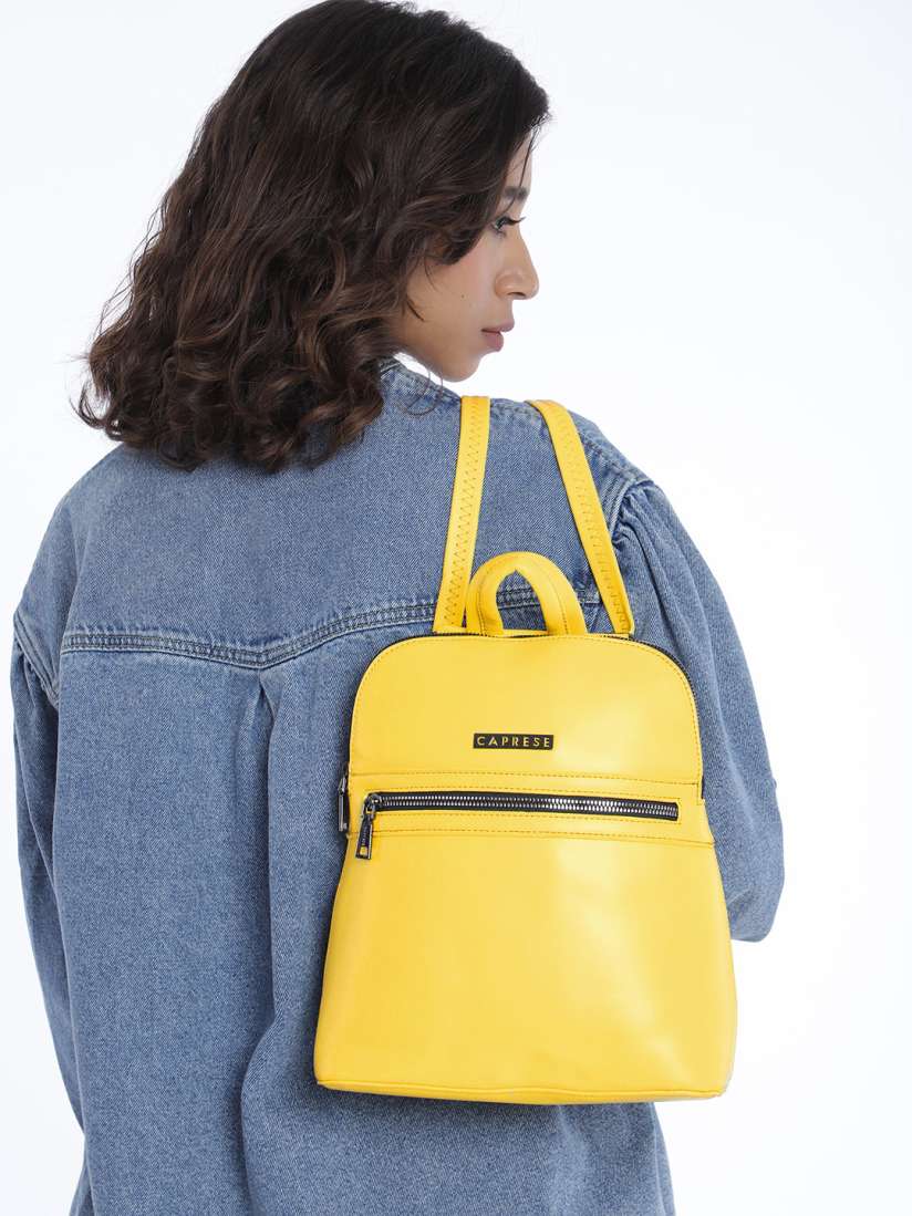Mustard yellow leather backpack top