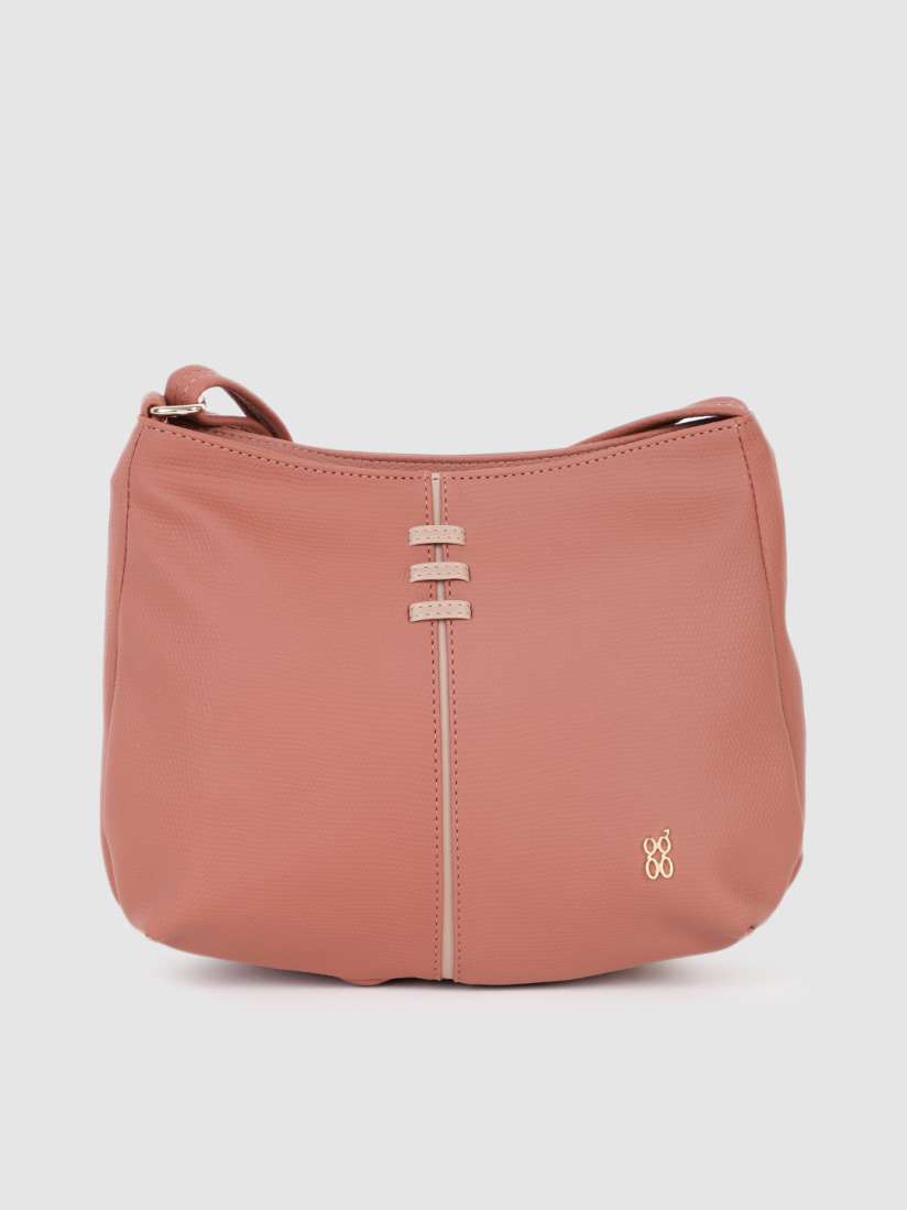 Baggit pink solid sling bag shop