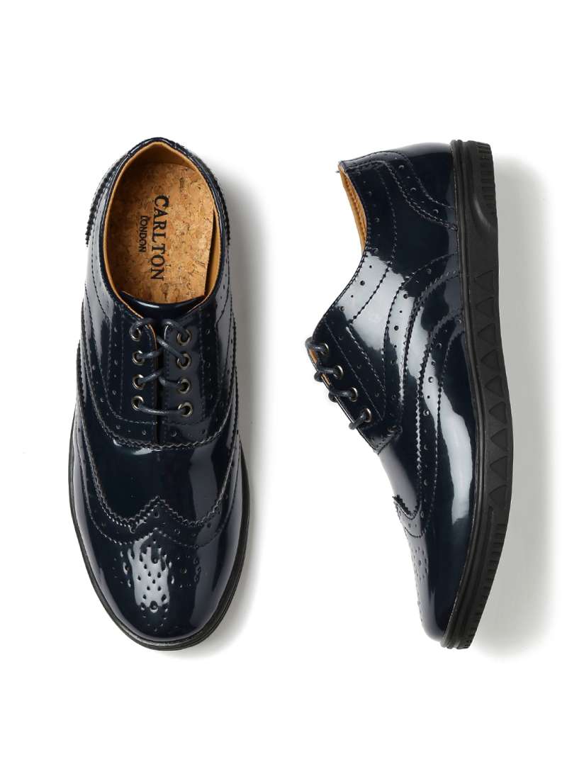Navy patent brogues hotsell