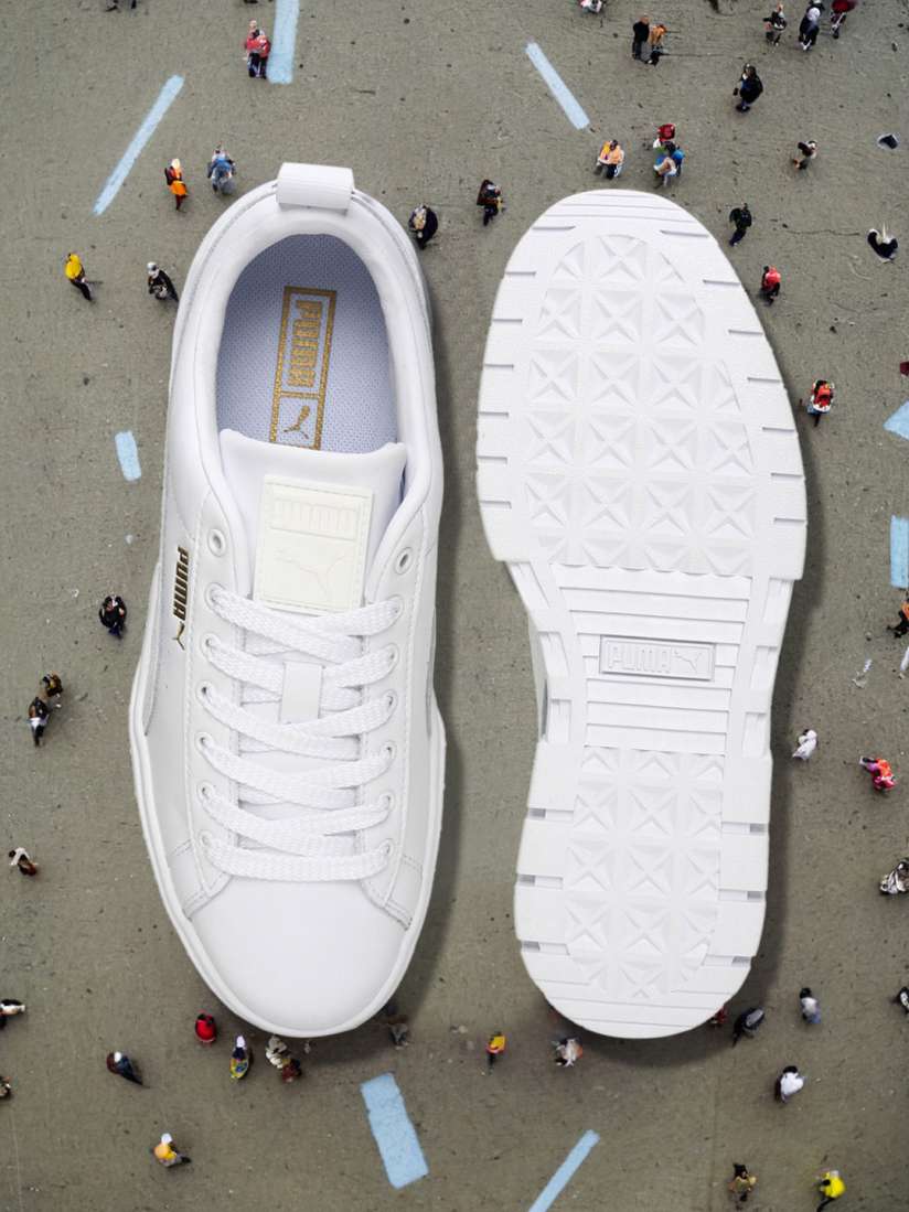 Puma white sneakers myntra shop