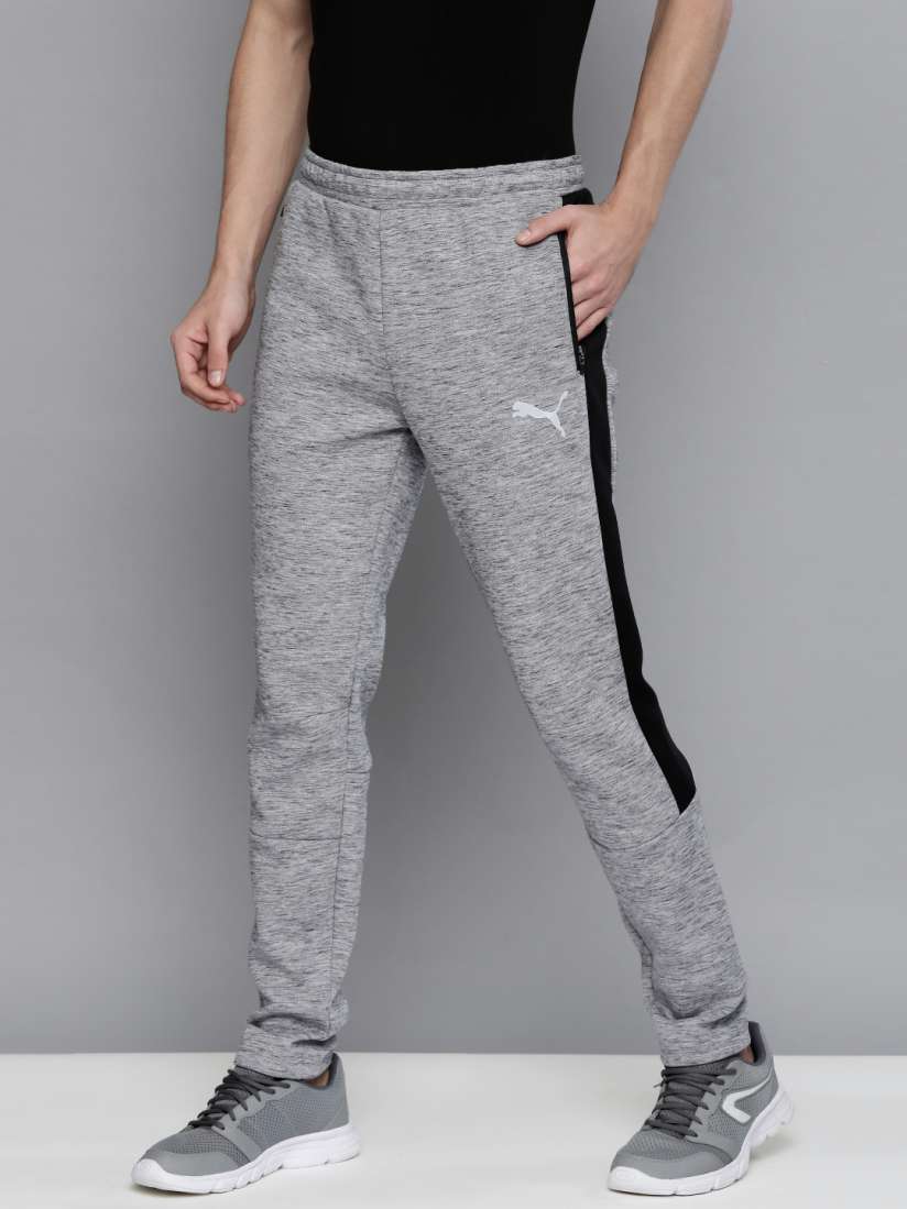 Buy Puma Men Grey Solid EVOSTRIPE Knitted Drycell Slim Fit Track Pants With Side Stripes Track Pants for Men 15118616 Myntra