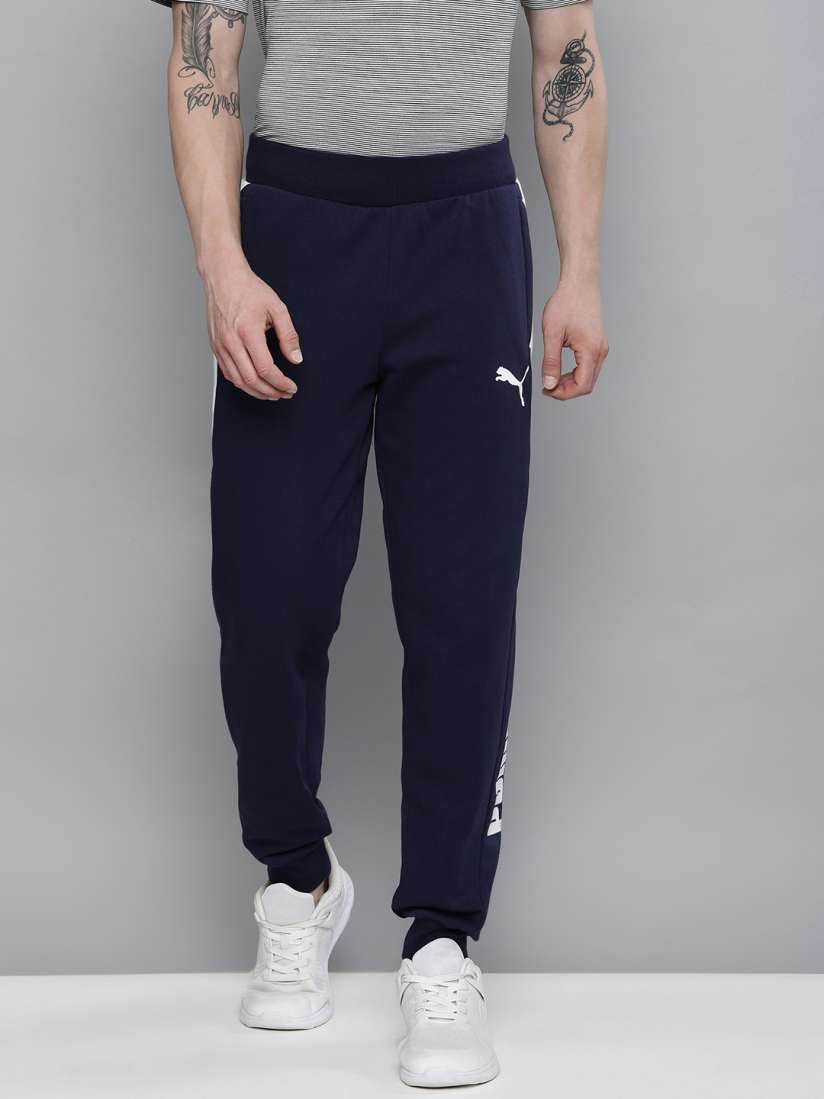 Puma track pants navy store