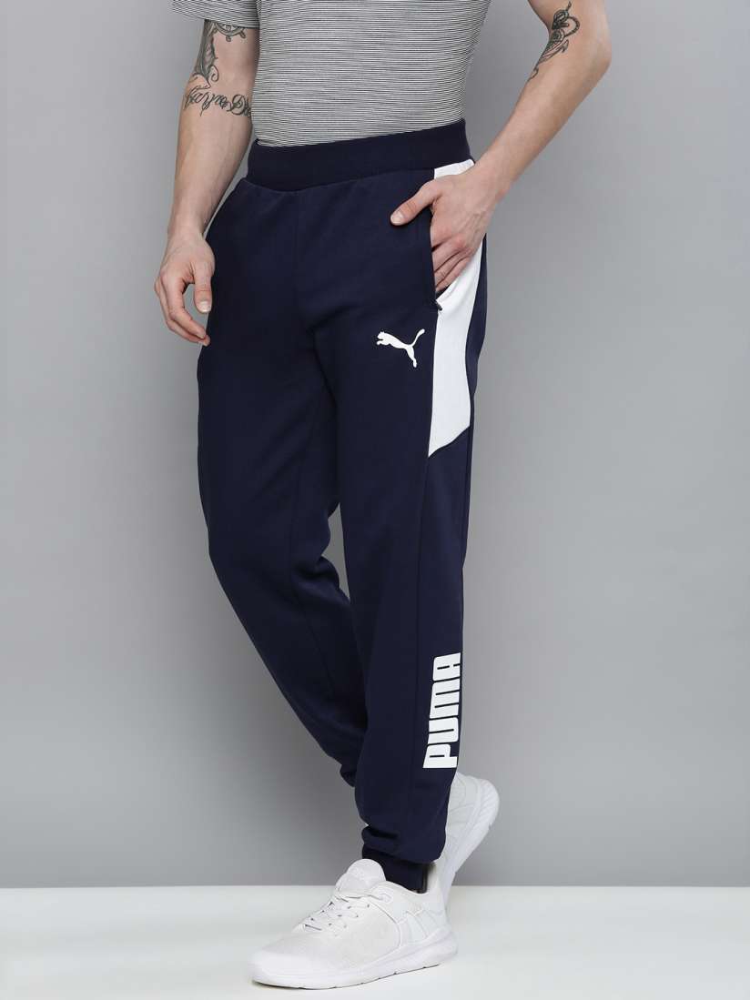 Buy Puma Men Navy Blue Solid Modern Sports Regular Fit Joggers With Side Stripes Track Pants for Men 15118672 Myntra