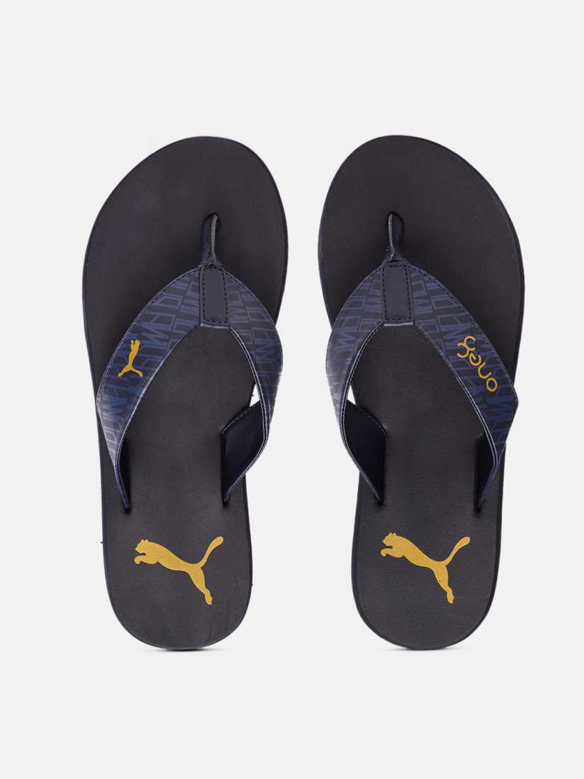 Buy one8 x PUMA Men Black Navy Blue Animalia V2 IDP Printed Thong Flip Flops Flip Flops for Men 15149316 Myntra