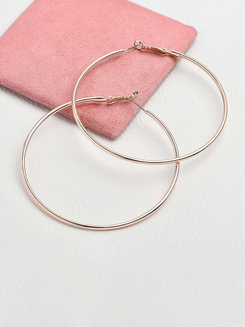 Accessorize rose gold earrings top
