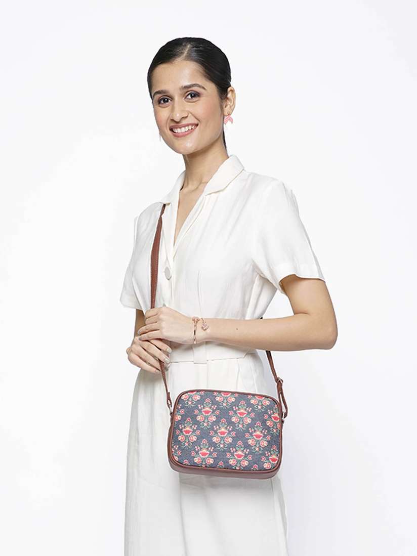 Buy ZOUK Navy Blue Floral Printed Structured Sling Bag with Tasselled Handbags for Women 16042688 Myntra