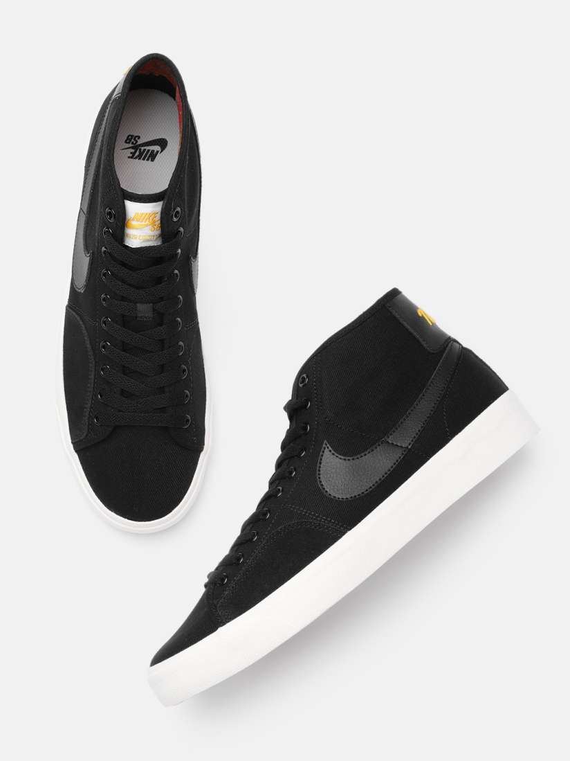 Nike skate shoes mid top online