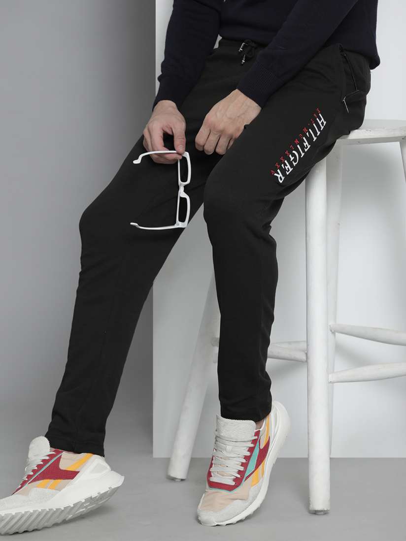 Buy Tommy Hilfiger Men Black Typography Printed Regular Track Pants Track Pants for Men 16362144 Myntra