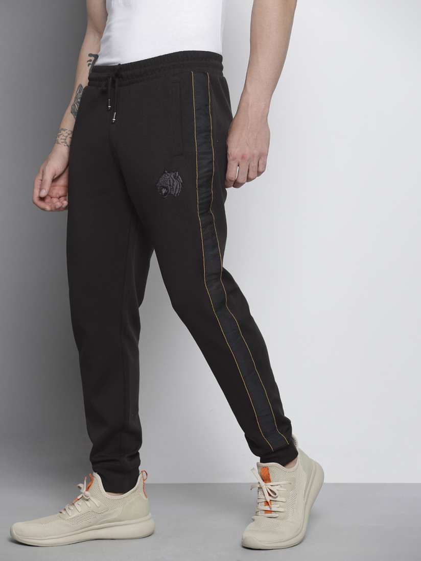 Buy Tommy Hilfiger Men Black Solid Joggers Track Pants for Men 16362186 Myntra