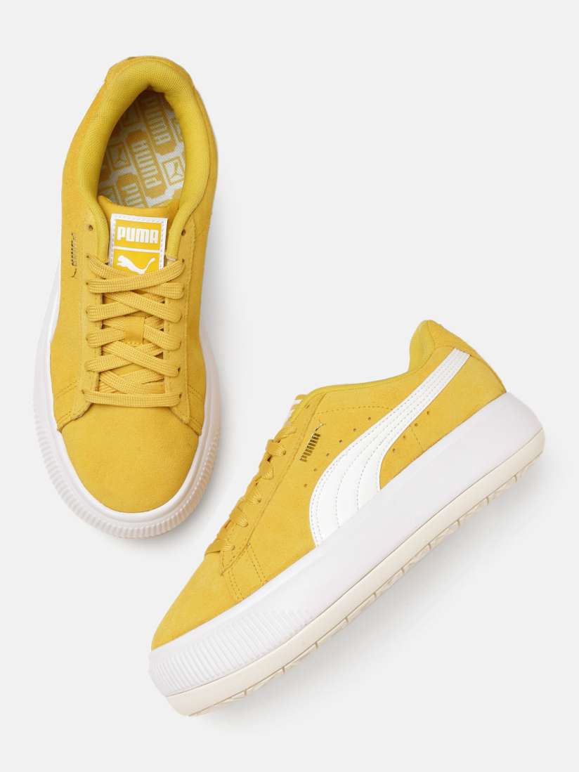 Yellow suede puma sneakers top