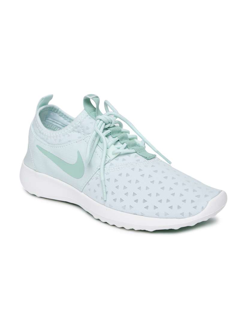 Mint green and grey nike shoes 2025