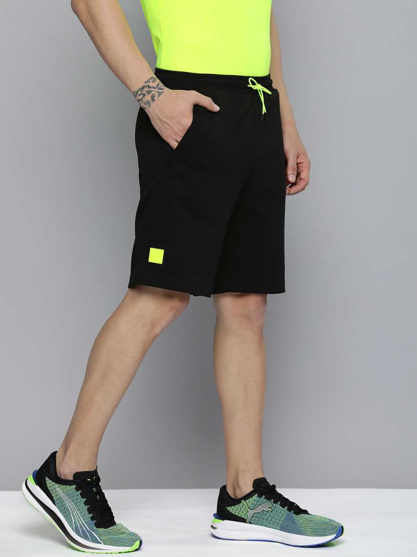 Buy one8 x PUMA Men Black Solid Virat Kohli Sports Shorts Shorts for Men 16850208 Myntra