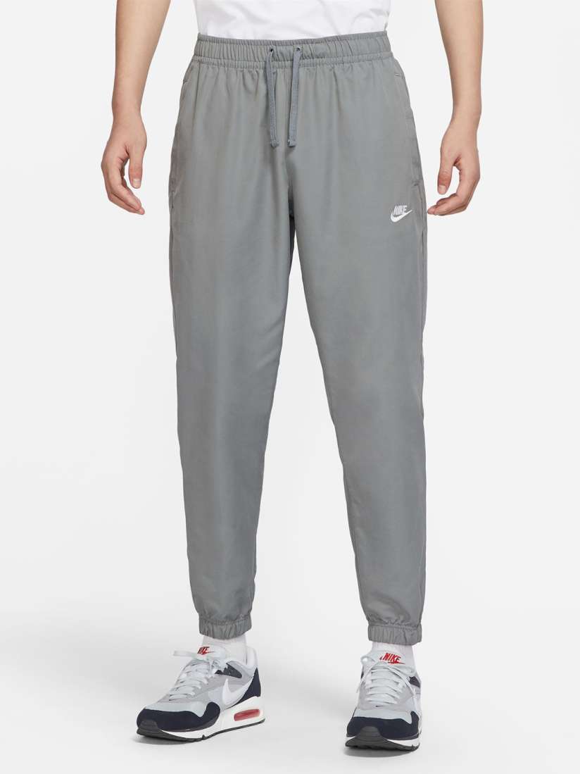 Buy Nike Sportswear Men s Unlined Cuff Trousers Track Pants for Men 17128178 Myntra