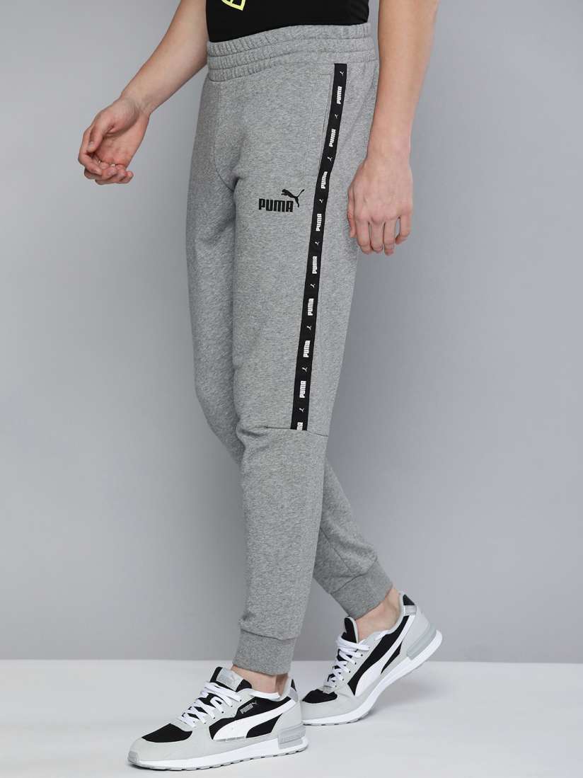 Buy Puma Typography Printed Mid Rise Regular Fit Joggers Sustainable Track Pants Track Pants for Men 17174316 Myntra