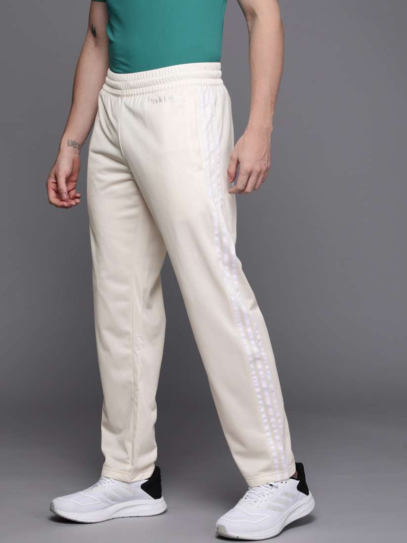 Cream adidas track pants outlet