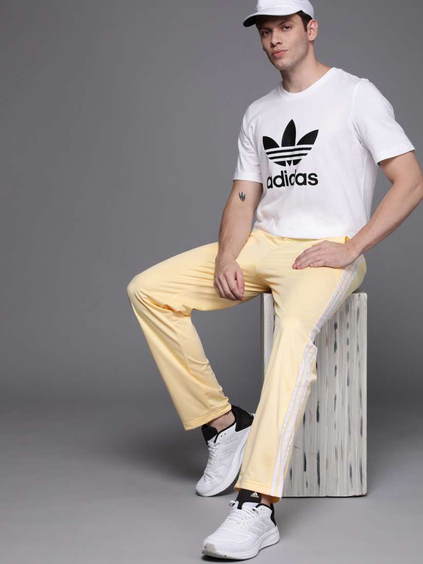 Yellow adidas track pants mens 2025