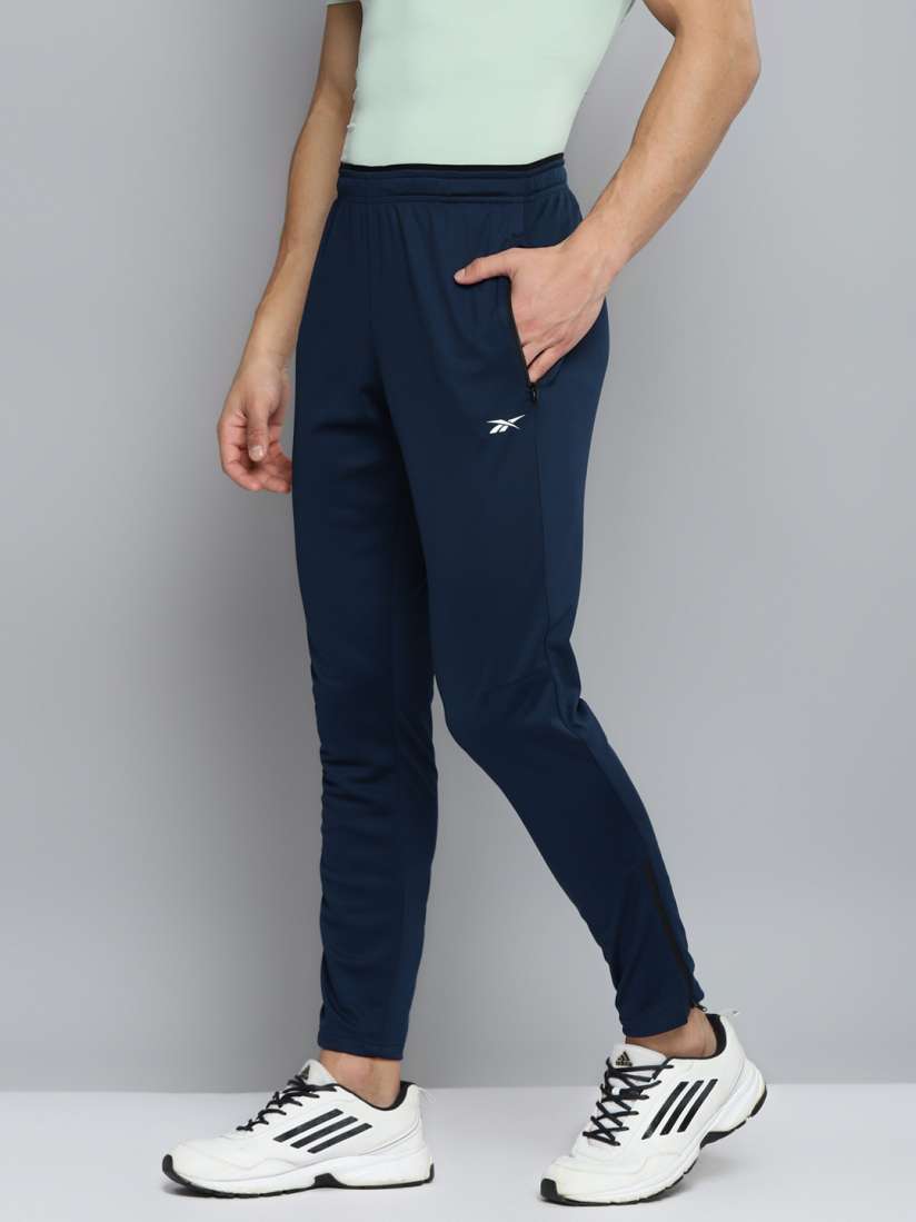 Buy Reebok Men Navy Blue Solid WOR SL Trackster Speedwick Training Track Pants Track Pants for Men 17210658 Myntra