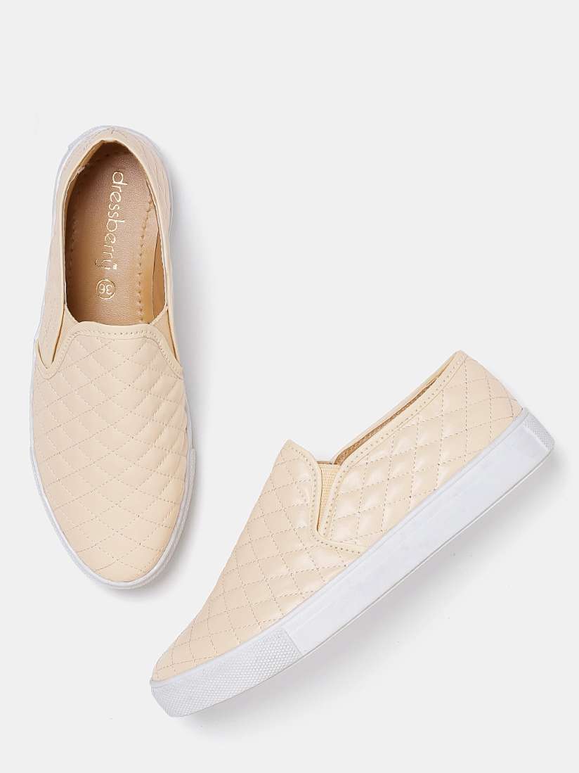 Tan quilted slip on sneakers best sale