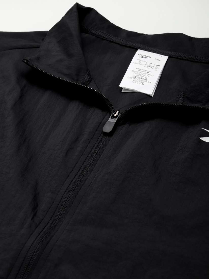Reebok solid men's track suit shop